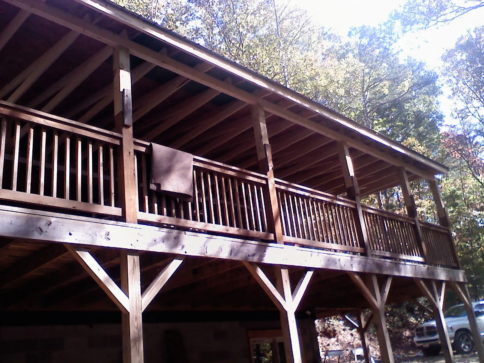 Timber framing under a new elevated porch and deck — Roof Leak Repair in Oneco by Roofing Brothers